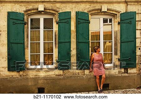 Stock Image - Woman at Bourg, Gironde, Aquitaine, France. Fotosearch