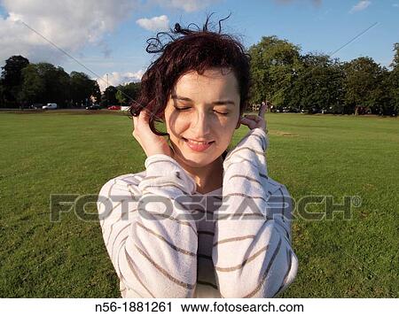 Woman at Ealing Common park View Large Photo Image Stock Image - Woman at Ealing Common park. Fotosearch