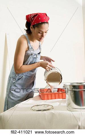 Woman at home painting View Large Photo Image Stock Image - Woman at home painting. Fotosearch