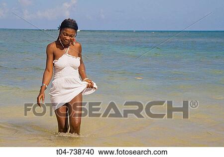 Woman at Las Terrenas beach, Dominican Republic View Large Photo Image Stock Image - Woman at Las Terrenas beach, Dominican Republic. Fotosearch