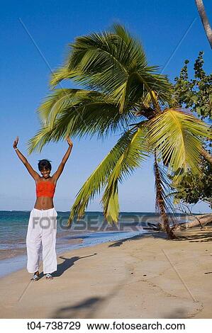 Woman at Las Terrenas beach, Dominican Republic View Large Photo Image Stock Photo - Woman at Las Terrenas beach, Dominican Republic. Fotosearch