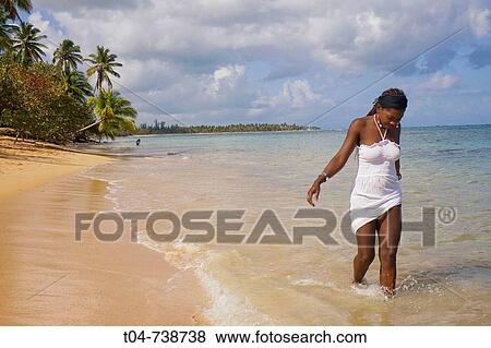 Woman at Las Terrenas beach, Dominican Republic View Large Photo Image Stock Photo - Woman at Las Terrenas beach, Dominican Republic. Fotosearch