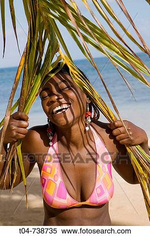 Woman at Las Terrenas beach, Dominican Republic View Large Photo Image Stock Photography - Woman at Las Terrenas beach, Dominican Republic. Fotosearch