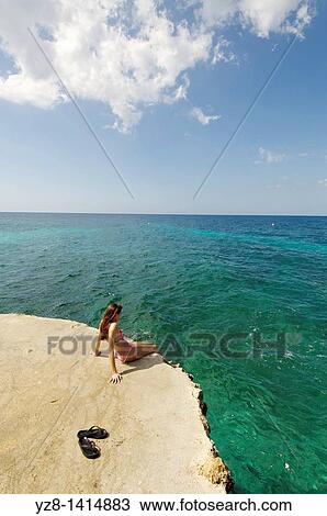 Woman at Ric's Cafe, Negril, Jamaica View Large Photo Image Stock Image - Woman at Ric's Cafe, Negril, Jamaica. Fotosearch
