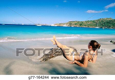 Woman at the beach. Colombier Bay. St. Barts. Caribbean View Large Photo Image Picture - Woman at the beach. Colombier Bay. St. Barts. Caribbean. Fotosearch