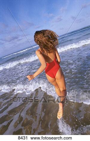 Woman at the beach View Large Photo Image Stock Image - Woman at the beach. Fotosearch