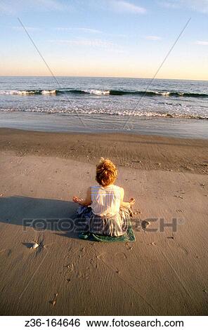 Woman at the beach View Large Photo Image Stock Photograph - Woman at the beach. Fotosearch