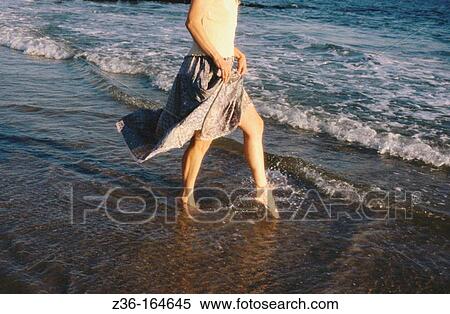 Woman at the beach View Large Photo Image Stock Photography - Woman at the beach. Fotosearch