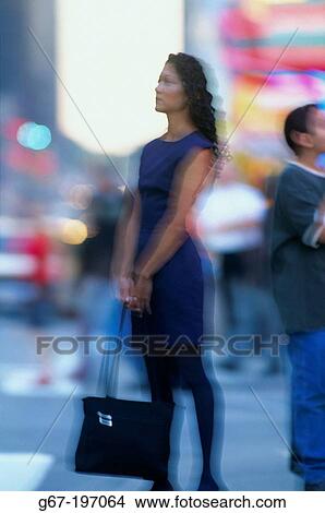 Woman at Times Square. New York City. USA View Large Photo Image Picture - Woman at Times Square. New York City. USA. Fotosearch