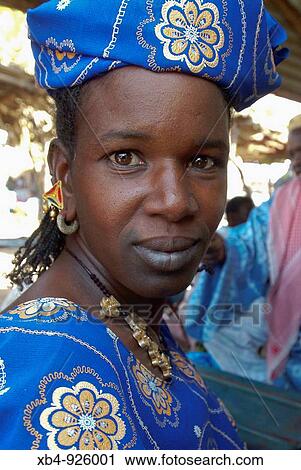 Woman at weekly market, Momar Sarr, Senegal View Large Photo Image Stock Image - Woman at weekly market, Momar Sarr, Senegal. Fotosearch