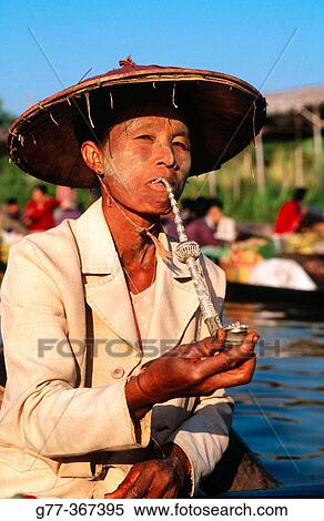 Woman at Ywama floating market. Inle Lake. Shan State. Myanmar. View Large Photo Image Stock Photography - Woman at Ywama floating market. Inle Lake. Shan State. Myanmar.. Fotosearch