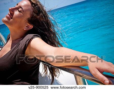 Woman basking in the sun. Dominican Republic View Large Photo Image Stock Photography - Woman basking in the sun. Dominican Republic. Fotosearch