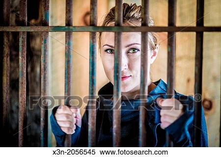 Woman behind bars. View Large Photo Image Stock Photography - Woman behind bars.. Fotosearch