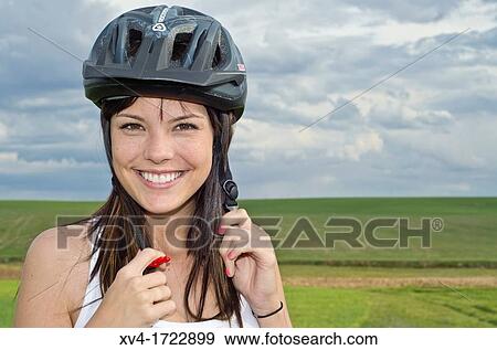 Woman biker enjoy in the ruralscape with her helmet Aragon, Spain View Large Photo Image Stock Photo - Woman biker enjoy in the ruralscape with her helmet Aragon, Spain. Fotosearch