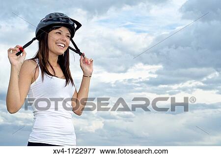 Woman biker enjoy in the ruralscape with her helmet Aragon, Spain View Large Photo Image Stock Photo - Woman biker enjoy in the ruralscape with her helmet Aragon, Spain. Fotosearch