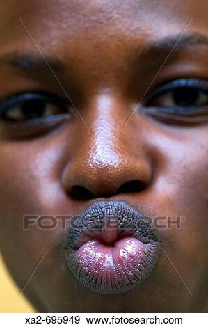 Woman blowing kiss View Large Photo Image Stock Photo - Woman blowing kiss. Fotosearch