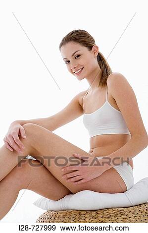 Stock Photo - Woman body care. Fotosearch