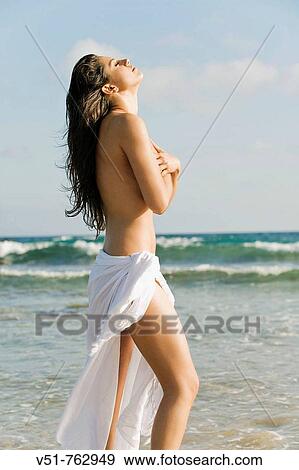 Woman breathing by the sea View Large Photo Image Stock Photo - Woman breathing by the sea. Fotosearch