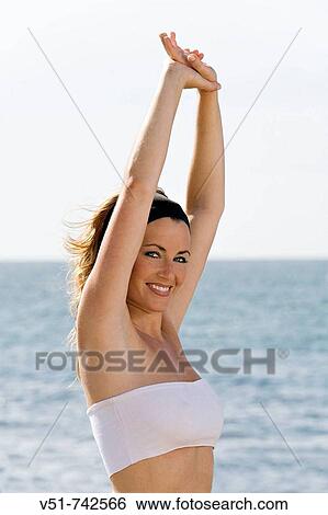 woman breathing by the sea View Large Photo Image Stock Photograph - woman breathing by the sea. Fotosearch