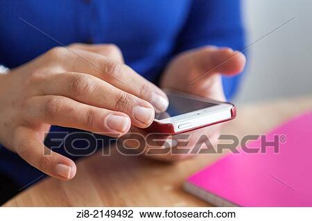Woman browsing the web on a smart phone-close-up View Large Photo Image Stock Image - Woman browsing the web on a smart phone-close-up. Fotosearch
