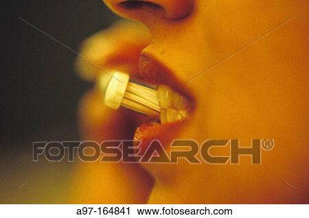 Woman brushing teeth View Large Photo Image Stock Image - Woman brushing teeth. Fotosearch