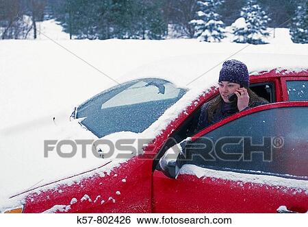 Stock Photograph - Woman calling for help. Fotosearch