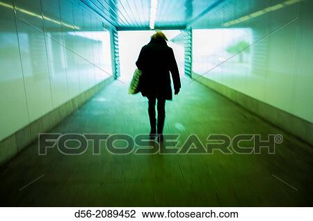 woman carriying a bag in a subway pass, Valencia, Spain. View Large Photo Image Stock Image - woman carriying a bag in a subway pass, Valencia, Spain.. Fotosearch