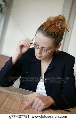 Woman checking stocks. View Large Photo Image Stock Image - Woman checking stocks.. Fotosearch