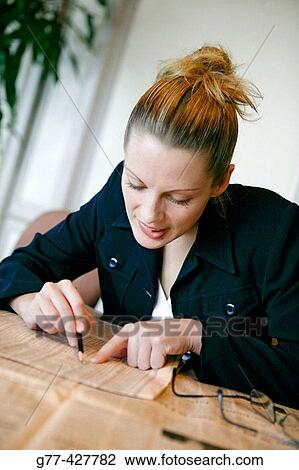 Woman checking stocks. View Large Photo Image Stock Image - Woman checking stocks.. Fotosearch
