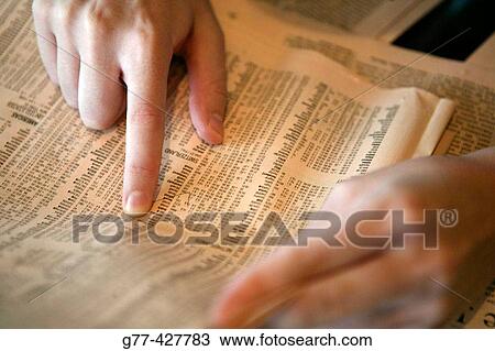 Woman checking stocks. View Large Photo Image Stock Image - Woman checking stocks.. Fotosearch