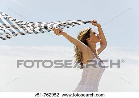 woman chilling by the sea View Large Photo Image Stock Image - woman chilling by the sea. Fotosearch
