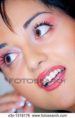 Woman close up during a make up session View Large Photo Image Stock Photograph - Woman close up during a make up session. Fotosearch
