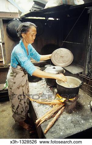 woman cooking, Sumbawa island, Lesser Sunda Islands, Republic of Indonesia, Southeast Asia and Oceania View Large Photo Image Stock Photograph - woman cooking, Sumbawa island, Lesser Sunda Islands, Republic of Indonesia, Southeast Asia and Oceania. Fotosearch