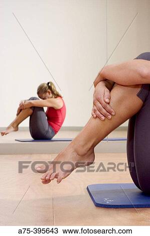woman doing a pilates exercise View Large Photo Image Stock Image - woman doing a pilates exercise. Fotosearch
