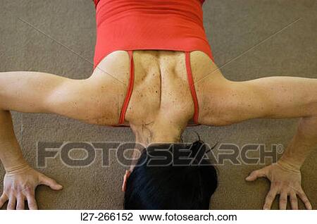 Woman doing push-ups View Large Photo Image Stock Image - Woman doing push-ups. Fotosearch