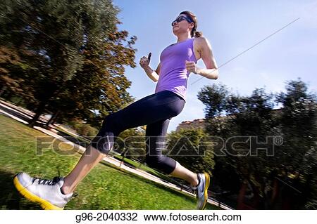 Woman doing workout outdoors. View Large Photo Image Stock Image - Woman doing workout outdoors.. Fotosearch