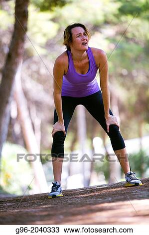 Woman doing workout outdoors. View Large Photo Image Stock Image - Woman doing workout outdoors.. Fotosearch