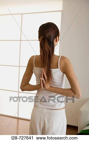Woman doing yoga at Home View Large Photo Image Stock Image - Woman doing yoga at Home. Fotosearch
