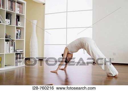 Woman Doing Yoga At Home View Large Photo Image Stock Photograph - Woman Doing Yoga At Home. Fotosearch