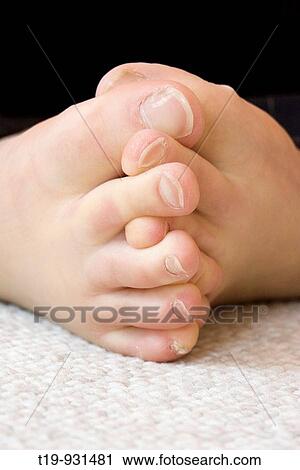 Stock Image - Woman doing yoga in a studio Pose:? Pada pada mudra? MR. Fotosearch