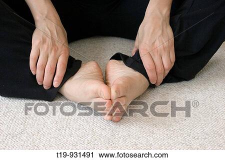 Woman doing yoga in a studio Pose:? Butterfly? MR View Large Photo Image Stock Image - Woman doing yoga in a studio Pose:? Butterfly? MR. Fotosearch