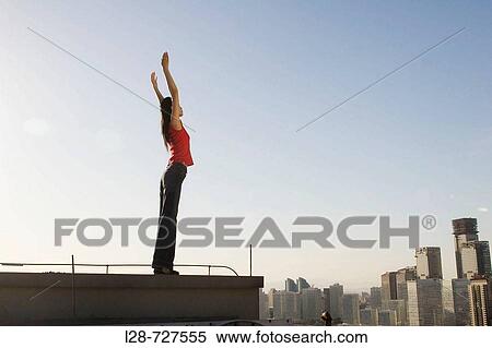 Woman doing yoga on roof View Large Photo Image Stock Photography - Woman doing yoga on roof. Fotosearch