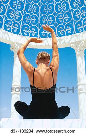 Woman doing yoga View Large Photo Image Picture - Woman doing yoga. Fotosearch