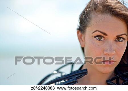 Woman dressed up with a futuristic space look costume holding a rusty trident, creating a modern interpretation of Salacia, Neptune's queen, an ocean Roman deity. View Large Photo Image Stock Image - Woman dressed up with a futuristic space look costume holding a rusty trident, creating a modern interpretation of Salacia, Neptune's queen, an ocean Roman deity.. Fotosearch