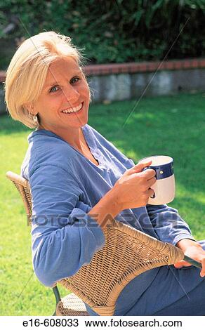 Woman drinking coffee View Large Photo Image Stock Image - Woman drinking coffee. Fotosearch