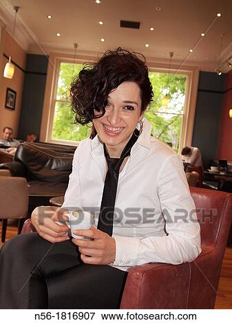 Woman drinking coffee View Large Photo Image Stock Photo - Woman drinking coffee. Fotosearch
