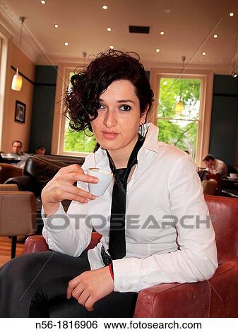 Woman drinking coffee View Large Photo Image Stock Photograph - Woman drinking coffee. Fotosearch