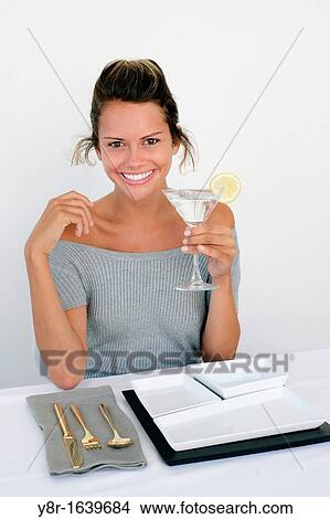 Picture - woman drinking. Fotosearch