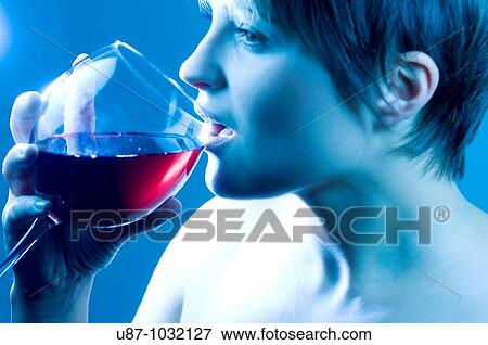 Woman drinking red wine View Large Photo Image Stock Photo - Woman drinking red wine. Fotosearch