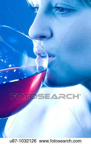 Woman drinking red wine View Large Photo Image Stock Photograph - Woman drinking red wine. Fotosearch